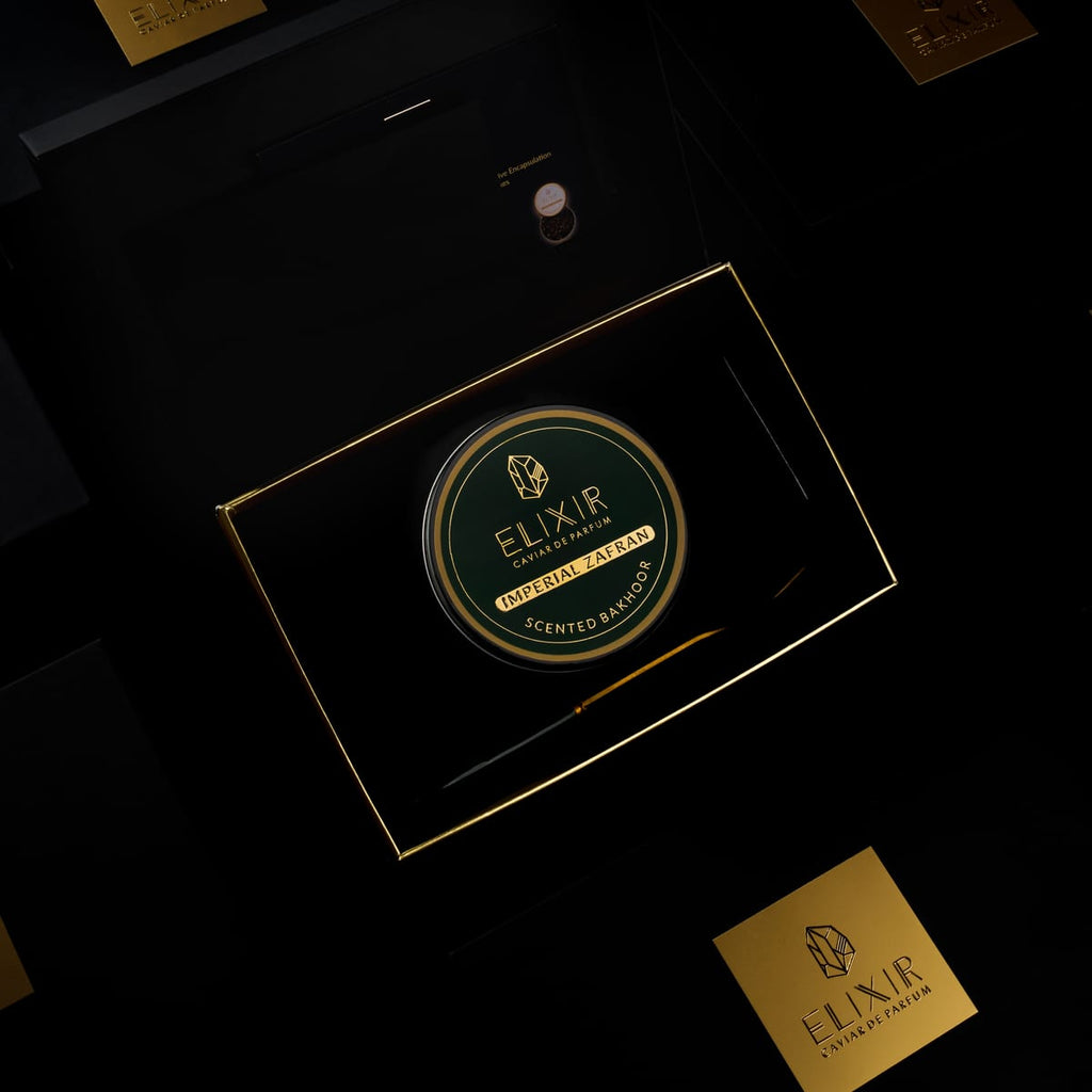 The Imperial Zafran box open, the green tin seated inside beside its spoon