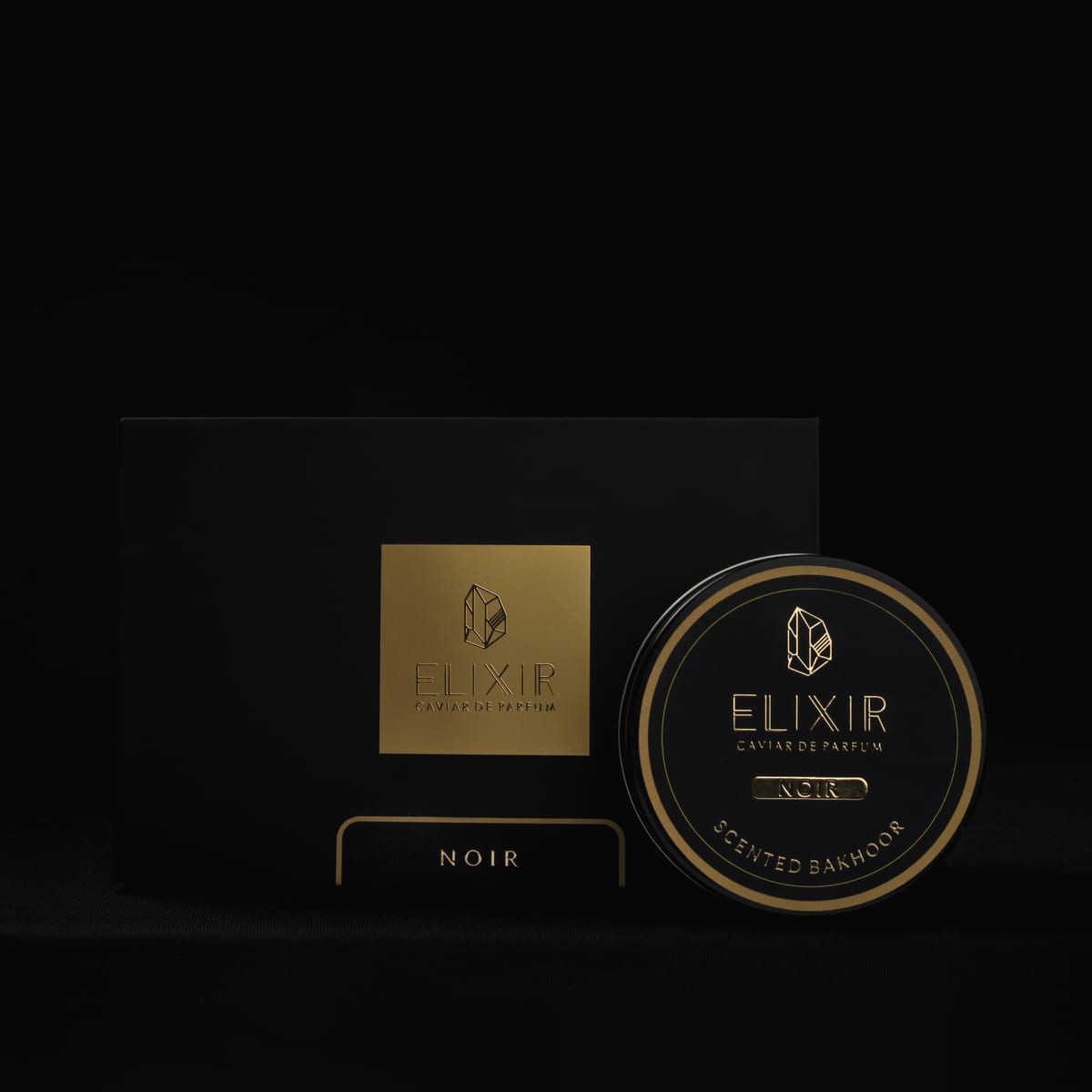 The Noir box and tin, front on